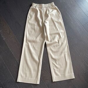 Nanushka Odessa wide leg pants vegan leather in cream white in small